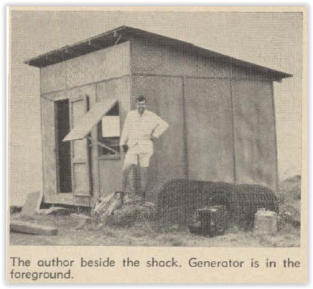  The author beside the shack. Generator is in the foreground.