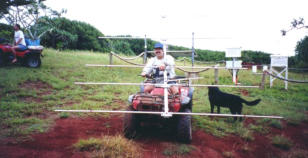  The chairman of the VP6PAC club, Dave Brown, transporting the yagi after the VP6BR station had been dismantled.The chairman of the VP6PAC club, Dave Brown, transporting the Yagi after the VP6BR station had been dismantled.